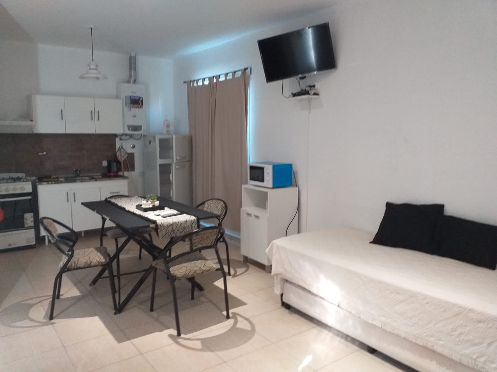 Living-comedor con TV